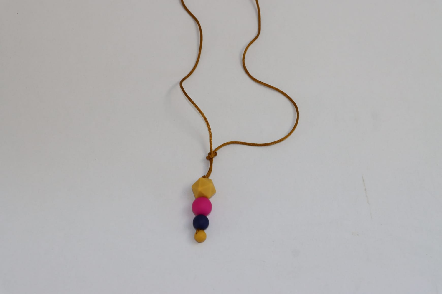 Breastfeeding necklace with string, with 4 colours in a row, BPA-free, handmade in Dublin.