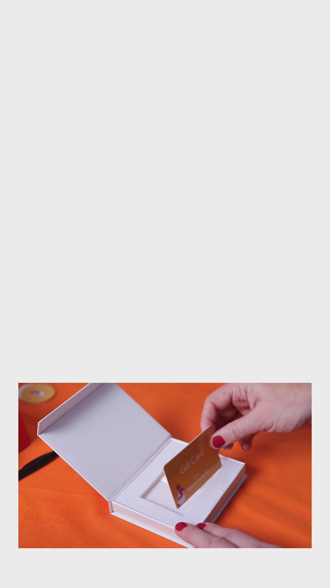 Carte-cadeau dans une boîte de présentation - Un cadeau d&