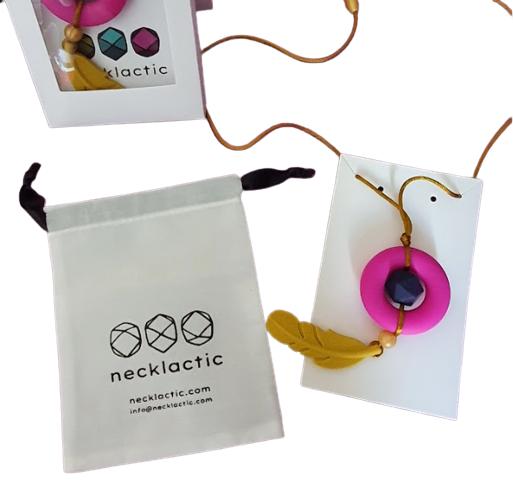 Breastfeeding necklace used by nursing mums to distract baby whilst feeding, made in colours of pink and mustard.