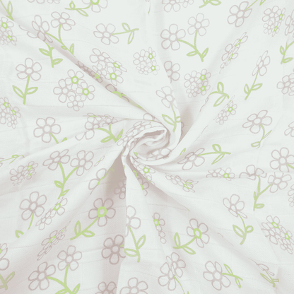 A muslin square cloths for baby in a pattern of flowers, made from bamboo and cotton.