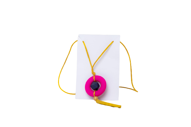 Breastfeeding necklace used by nursing mums to distract baby whilst feeding, made in colours of pink and mustard.