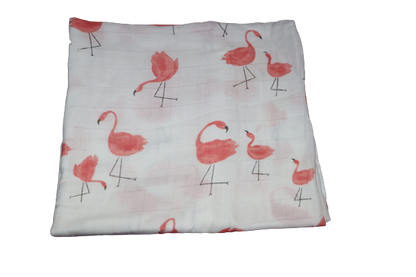 Swaddle Muslin for a baby in a pattern of pink flamingos, made from cotton.