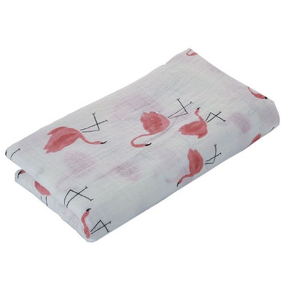 Swaddle Muslin for a baby in a pattern of pink flamingos, made from cotton.